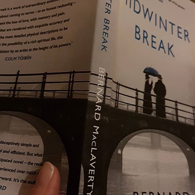 Midwinter break by Bernard Mac Laverty. 
So far it's gripping me. Love the narrative style and the feeling that something is not quite right in the marriage of the couple in this story.