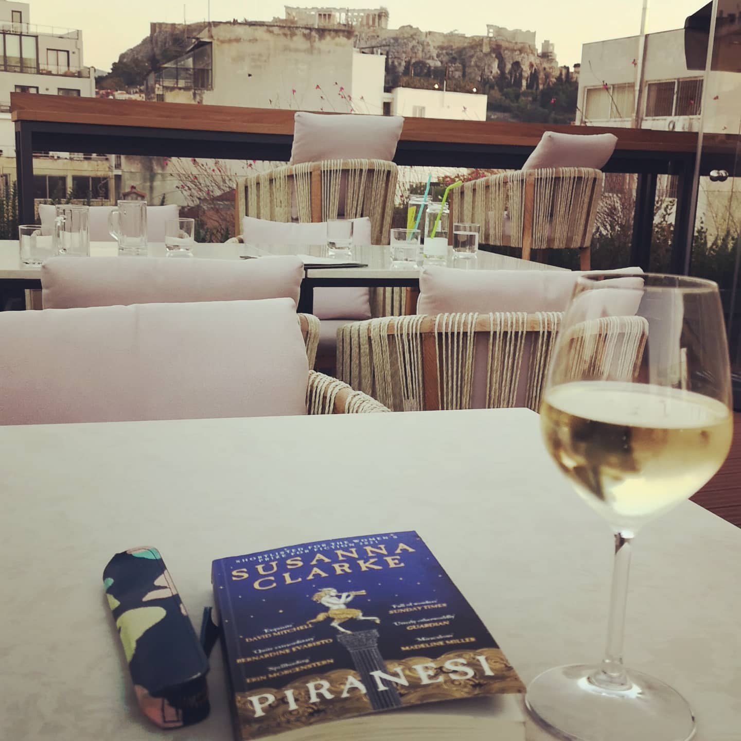 I think that books you read on a holiday become very special. A book that is average can be enhanced by a holiday vibe. And prosecco. And a rooftop view of the Parthenon in Athens but it sounds like I'm boasting a bit now.

However, Piranesi by Susanna Clarke needs no enhancing. I'm finding it riveting and mind bending. Oh and easy to read.